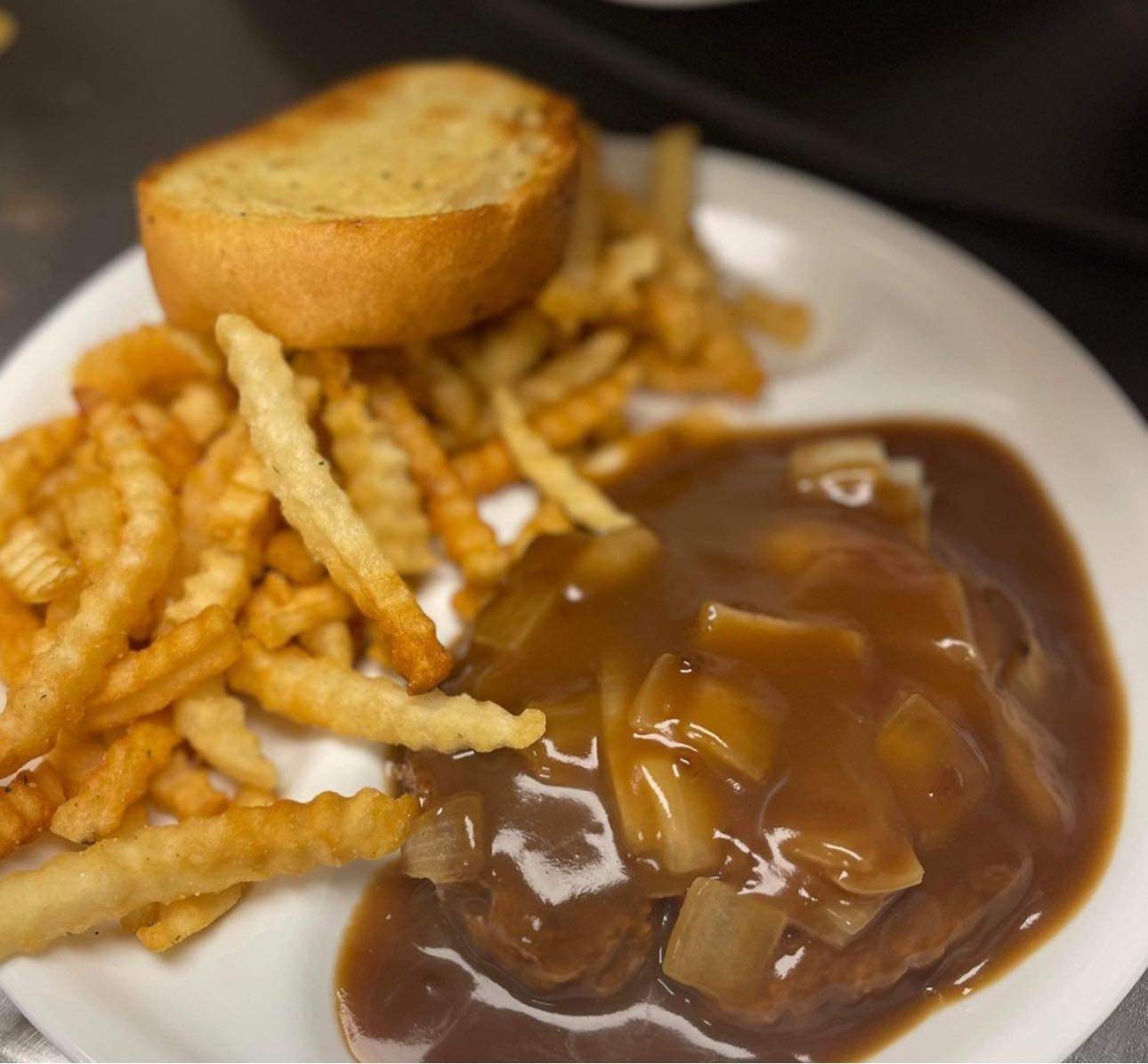 Smothered hamburger steak with onions and gravy